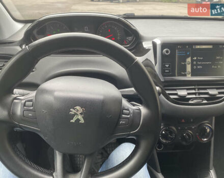 Черный Пежо 208, объемом двигателя 1.56 л и пробегом 214 тыс. км за 8250 $, фото 20 на Automoto.ua