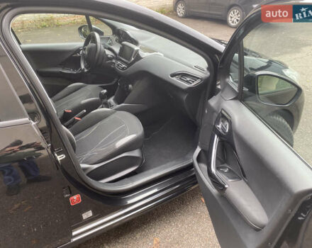 Черный Пежо 208, объемом двигателя 1.56 л и пробегом 214 тыс. км за 8250 $, фото 13 на Automoto.ua