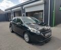 Черный Пежо 208, объемом двигателя 1.6 л и пробегом 134 тыс. км за 8021 $, фото 1 на Automoto.ua