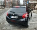 Чорний Пежо 208, об'ємом двигуна 1.2 л та пробігом 76 тис. км за 7900 $, фото 25 на Automoto.ua