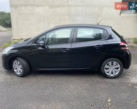 Черный Пежо 208, объемом двигателя 1.56 л и пробегом 214 тыс. км за 8250 $, фото 7 на Automoto.ua