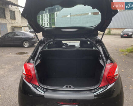 Черный Пежо 208, объемом двигателя 1.56 л и пробегом 214 тыс. км за 8250 $, фото 15 на Automoto.ua