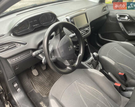 Черный Пежо 208, объемом двигателя 1.56 л и пробегом 214 тыс. км за 8250 $, фото 10 на Automoto.ua