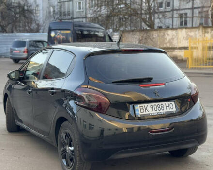 Чорний Пежо 208, об'ємом двигуна 1.4 л та пробігом 228 тис. км за 6300 $, фото 2 на Automoto.ua