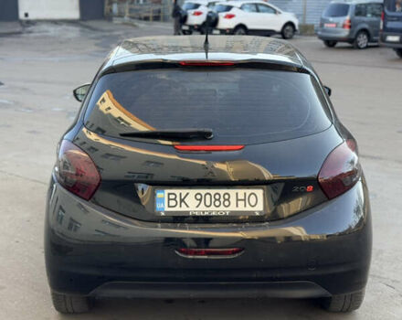 Чорний Пежо 208, об'ємом двигуна 1.4 л та пробігом 228 тис. км за 6300 $, фото 3 на Automoto.ua