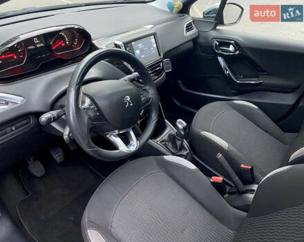 Черный Пежо 208, объемом двигателя 1.2 л и пробегом 117 тыс. км за 6900 $, фото 15 на Automoto.ua