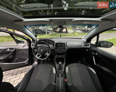 Черный Пежо 208, объемом двигателя 1.2 л и пробегом 115 тыс. км за 6700 $, фото 20 на Automoto.ua