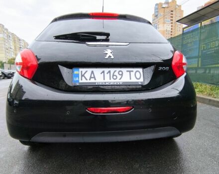 Черный Пежо 208, объемом двигателя 1.2 л и пробегом 117 тыс. км за 6300 $, фото 3 на Automoto.ua