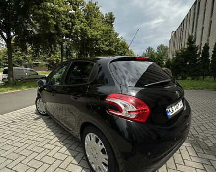 Черный Пежо 208, объемом двигателя 1.2 л и пробегом 115 тыс. км за 6700 $, фото 7 на Automoto.ua
