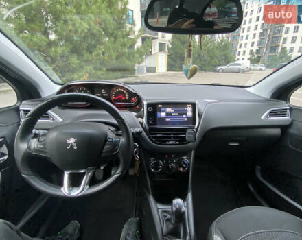 Черный Пежо 208, объемом двигателя 1.2 л и пробегом 117 тыс. км за 6900 $, фото 17 на Automoto.ua