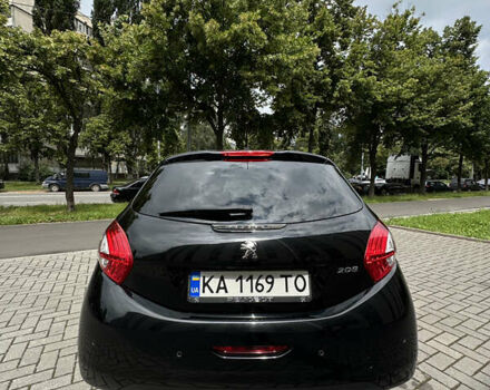 Черный Пежо 208, объемом двигателя 1.2 л и пробегом 115 тыс. км за 6700 $, фото 9 на Automoto.ua