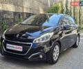 Чорний Пежо 208, об'ємом двигуна 1.2 л та пробігом 209 тис. км за 8499 $, фото 1 на Automoto.ua