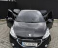 Чорний Пежо 208, об'ємом двигуна 1.4 л та пробігом 210 тис. км за 8600 $, фото 1 на Automoto.ua