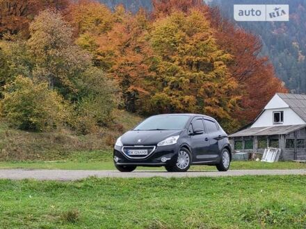 Чорний Пежо 208, об'ємом двигуна 1.4 л та пробігом 131 тис. км за 7100 $, фото 1 на Automoto.ua