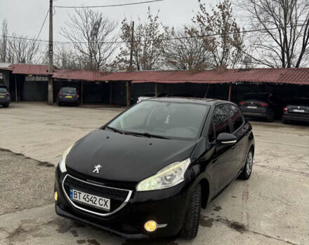 Черный Пежо 208, объемом двигателя 1.6 л и пробегом 230 тыс. км за 6000 $, фото 1 на Automoto.ua