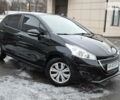 Чорний Пежо 208, об'ємом двигуна 1.6 л та пробігом 122 тис. км за 9000 $, фото 1 на Automoto.ua