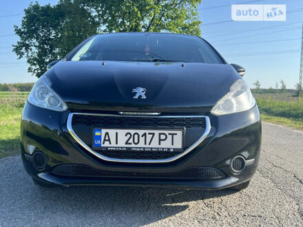 Пежо 208 2013 у Києві на Automoto.ua Чорний Пежо 208, об'ємом двигуна 1.2 л та пробігом 170 тис. км за 6400 $, фото 1 на Automoto.ua