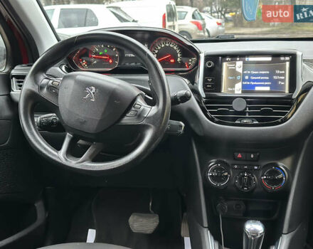 Красный Пежо 208, объемом двигателя 1.2 л и пробегом 177 тыс. км за 5350 $, фото 12 на Automoto.ua