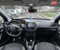 Красный Пежо 208, объемом двигателя 1.2 л и пробегом 177 тыс. км за 5500 $, фото 11 на Automoto.ua