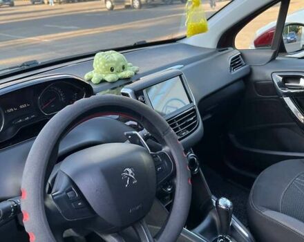 Червоний Пежо 208, об'ємом двигуна 1.2 л та пробігом 115 тис. км за 7300 $, фото 11 на Automoto.ua