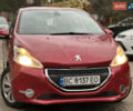 Красный Пежо 208, объемом двигателя 1.2 л и пробегом 177 тыс. км за 5500 $, фото 1 на Automoto.ua