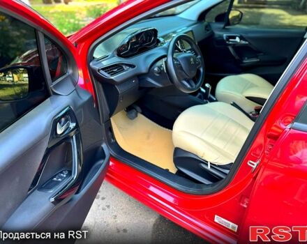 Красный Пежо 208, объемом двигателя 1.2 л и пробегом 101 тыс. км за 7400 $, фото 6 на Automoto.ua