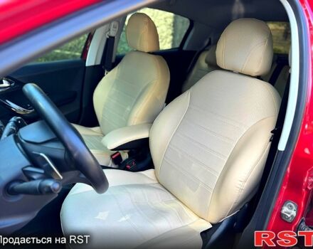 Красный Пежо 208, объемом двигателя 1.2 л и пробегом 101 тыс. км за 7400 $, фото 12 на Automoto.ua