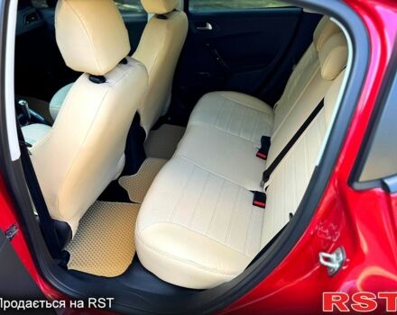 Красный Пежо 208, объемом двигателя 1.2 л и пробегом 101 тыс. км за 7400 $, фото 13 на Automoto.ua