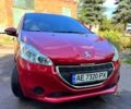 Красный Пежо 208, объемом двигателя 1.2 л и пробегом 101 тыс. км за 7400 $, фото 1 на Automoto.ua