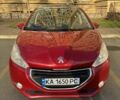 Красный Пежо 208, объемом двигателя 1.2 л и пробегом 165 тыс. км за 8500 $, фото 2 на Automoto.ua