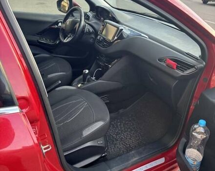Красный Пежо 208, объемом двигателя 1.2 л и пробегом 165 тыс. км за 8500 $, фото 9 на Automoto.ua