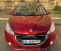 Красный Пежо 208, объемом двигателя 1.2 л и пробегом 165 тыс. км за 8500 $, фото 17 на Automoto.ua