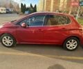 Красный Пежо 208, объемом двигателя 1.2 л и пробегом 165 тыс. км за 8500 $, фото 2 на Automoto.ua