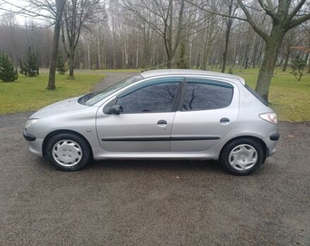 Сірий Пежо 208, об'ємом двигуна 1.4 л та пробігом 230 тис. км за 2349 $, фото 1 на Automoto.ua