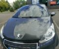 Сірий Пежо 208, об'ємом двигуна 1.4 л та пробігом 251 тис. км за 7000 $, фото 1 на Automoto.ua