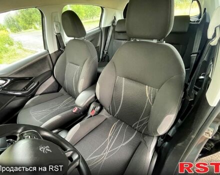 Серый Пежо 208, объемом двигателя 1.4 л и пробегом 177 тыс. км за 5350 $, фото 7 на Automoto.ua