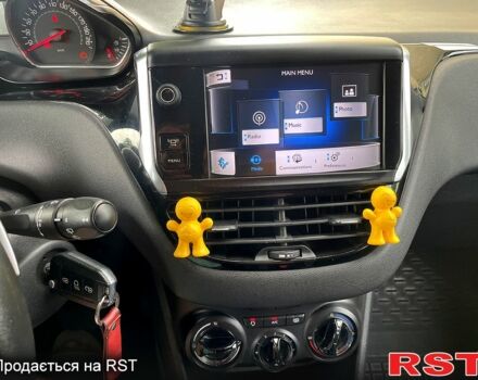 Серый Пежо 208, объемом двигателя 1.4 л и пробегом 177 тыс. км за 5350 $, фото 6 на Automoto.ua