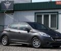 Сірий Пежо 208, об'ємом двигуна 1.4 л та пробігом 273 тис. км за 6990 $, фото 1 на Automoto.ua