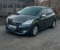 Сірий Пежо 208, об'ємом двигуна 1.4 л та пробігом 130 тис. км за 6700 $, фото 2 на Automoto.ua