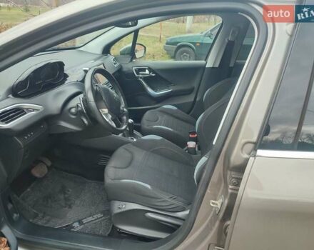 Серый Пежо 208, объемом двигателя 1.57 л и пробегом 190 тыс. км за 7700 $, фото 6 на Automoto.ua