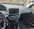 Серый Пежо 208, объемом двигателя 1.57 л и пробегом 190 тыс. км за 7700 $, фото 11 на Automoto.ua
