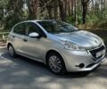 Серый Пежо 208, объемом двигателя 1 л и пробегом 175 тыс. км за 4500 $, фото 1 на Automoto.ua
