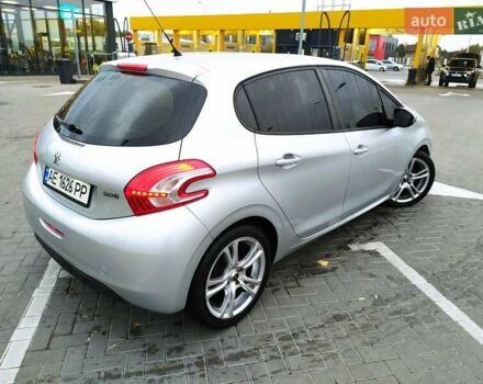 Пежо 208 2013 в Днепре (Днепропетровске) на Automoto.ua Серый Пежо 208, объемом двигателя 1.2 л и пробегом 175 тыс. км за 6200 $, фото 6 на Automoto.ua