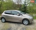 Серый Пежо 208, объемом двигателя 1.2 л и пробегом 99 тыс. км за 7500 $, фото 1 на Automoto.ua