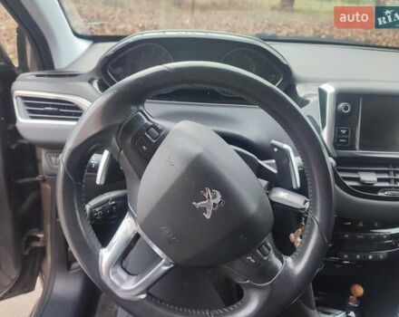 Серый Пежо 208, объемом двигателя 1.57 л и пробегом 190 тыс. км за 7700 $, фото 9 на Automoto.ua