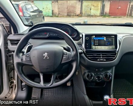 Сірий Пежо 208, об'ємом двигуна 1.2 л та пробігом 73 тис. км за 7500 $, фото 7 на Automoto.ua