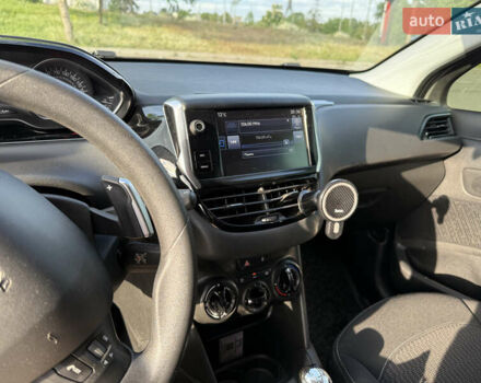 Сірий Пежо 208, об'ємом двигуна 1.2 л та пробігом 119 тис. км за 8500 $, фото 12 на Automoto.ua