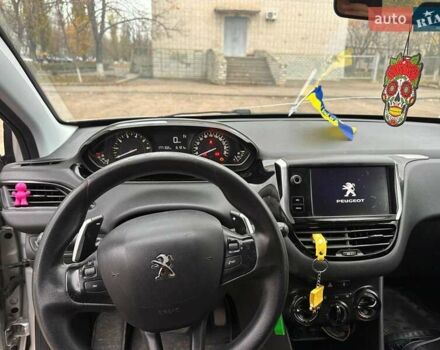Серый Пежо 208, объемом двигателя 1.2 л и пробегом 172 тыс. км за 8700 $, фото 25 на Automoto.ua