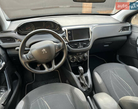 Синій Пежо 208, об'ємом двигуна 1.2 л та пробігом 200 тис. км за 5200 $, фото 15 на Automoto.ua