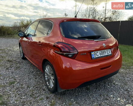 Помаранчевий Пежо 208, об'ємом двигуна 1.2 л та пробігом 125 тис. км за 8300 $, фото 3 на Automoto.ua